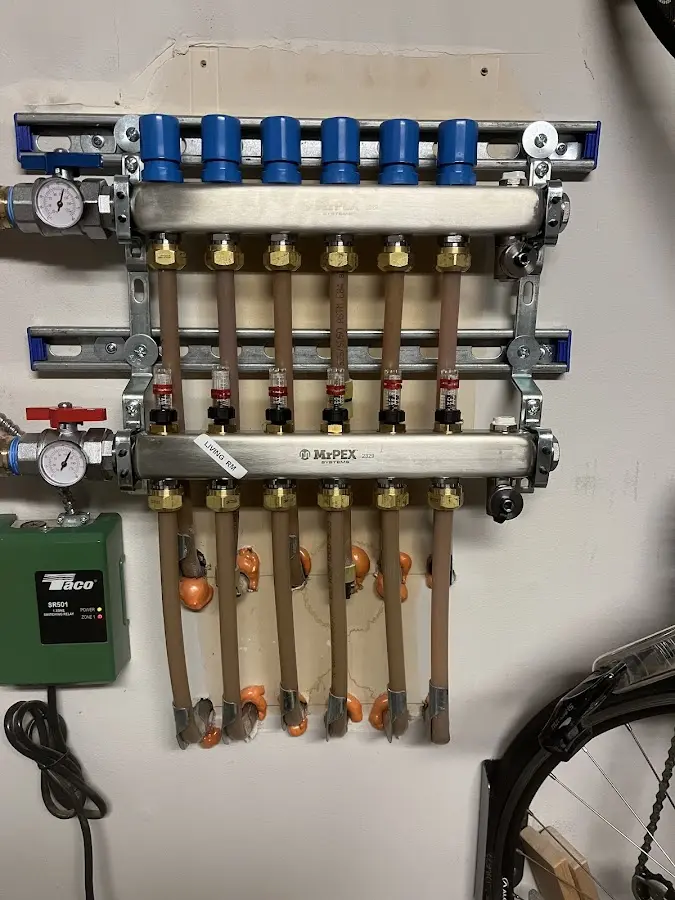 Plumber performing Leak Detection at a residential property in Acme