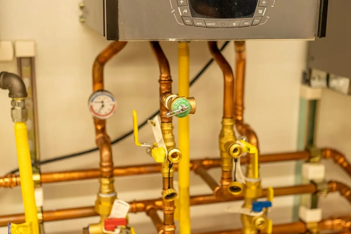 Licensed technician providing Backflow Prevention for a homeowner in Acme